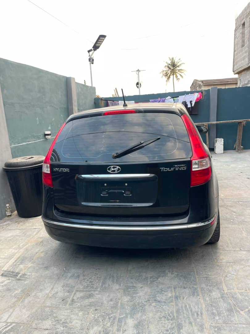 Black 2012 Hyundai Touring front view